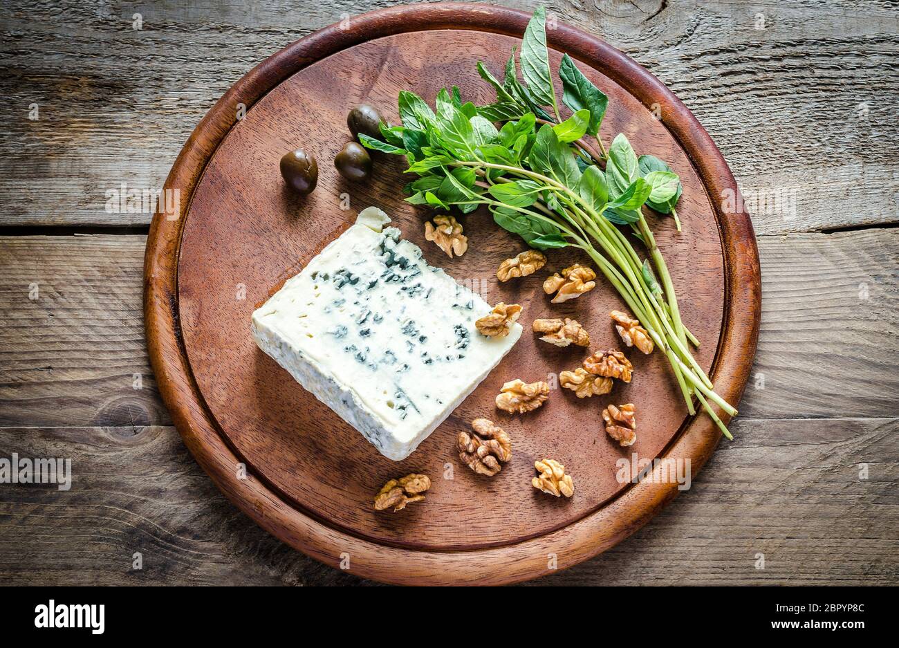 Blue cheese with walnuts Stock Photo