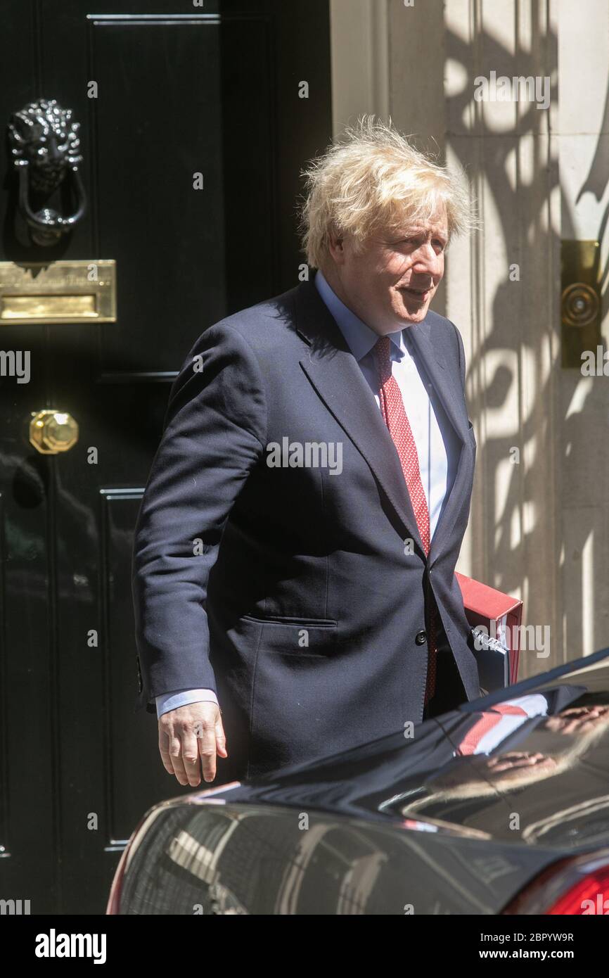 WESTMINSTER LONDON, UK. British Prime Minister Boris Johnson leaves 10 Downing Street to attend the weekly (PMQs) Prime Ministers Questions before the Parliamentary recess  at Parliament to face the leader of the opposition Keir Starmer at the despatch box during the coronavirus crisis. Credit: amer ghazzal/Alamy Live News Stock Photo