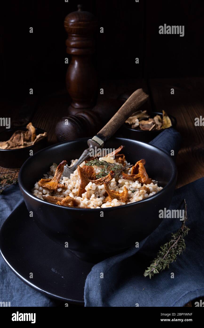Kaszotto- polish risotto from barley groats with mushrooms Stock Photo ...