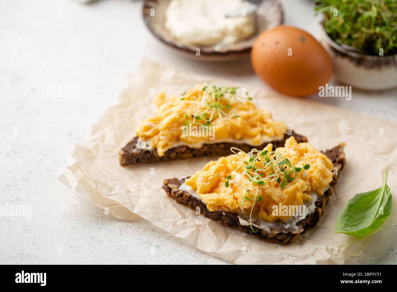 Scrambled Egg Sandwich With Cream Cheese On Rye Toast For Breakfast On White Background Healthy Breakfast Or Snack Stock Photo Alamy