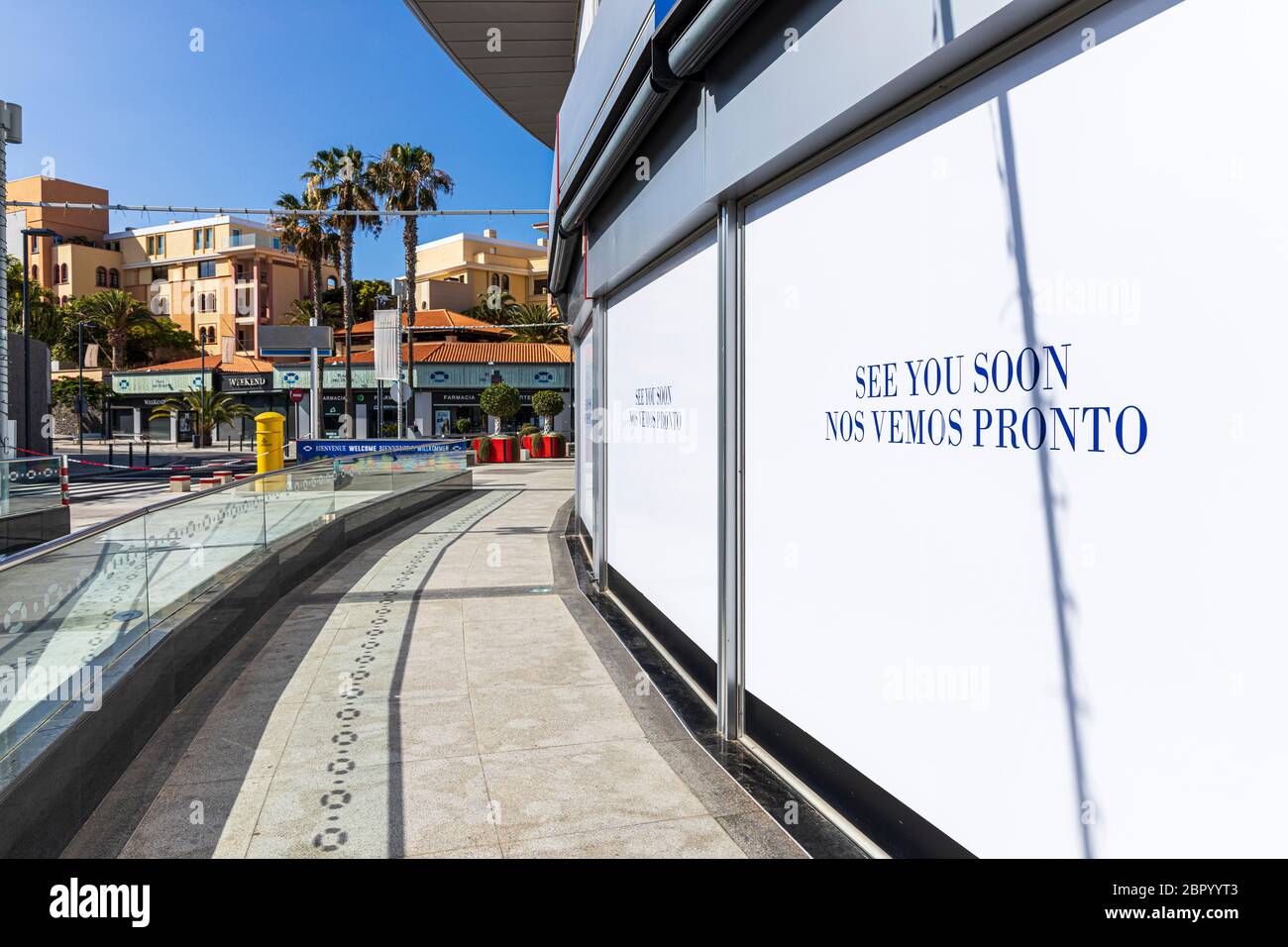 Bilingual, English and Spanish sign See you Soon, Nos Vemos Pronto, on