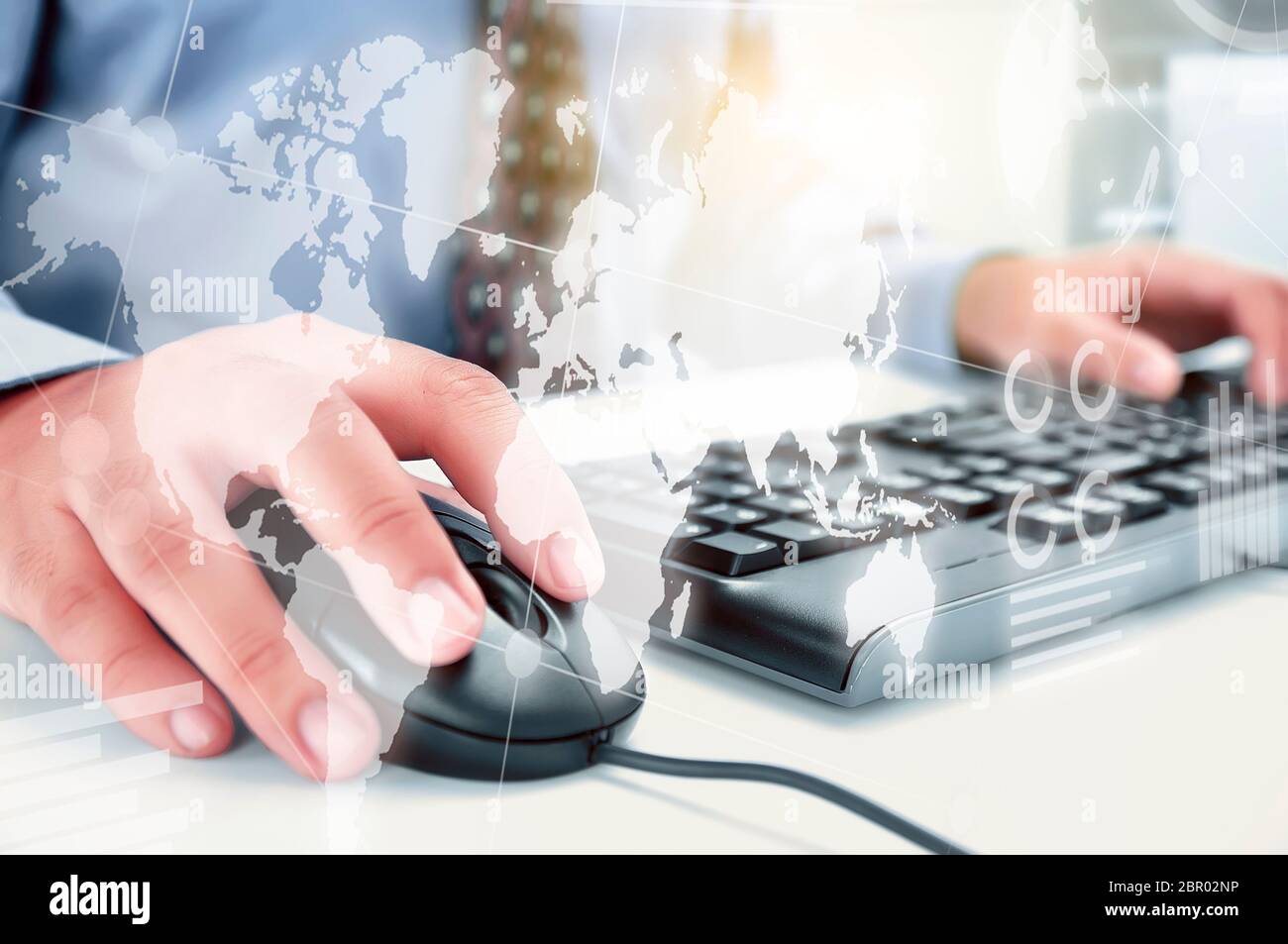 Digital interface graphs world - Businessman Working With Keyboard And Mouse On The Desk With Display Interface Of World Map Chart And Graphs Digital Technology Concept 2BR02NP