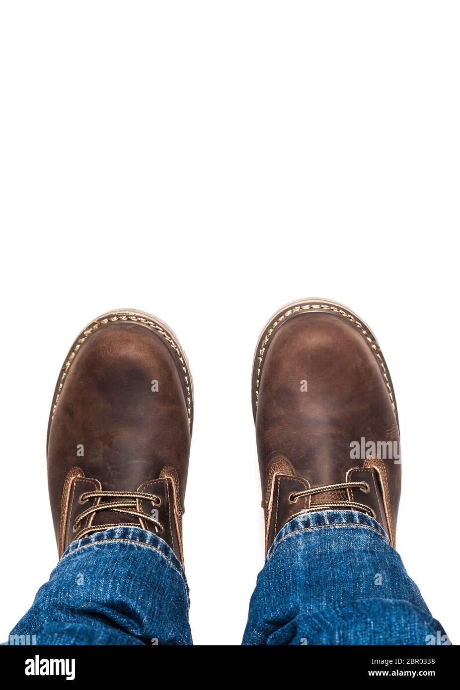 brown boots and blue jeans. Isolated 