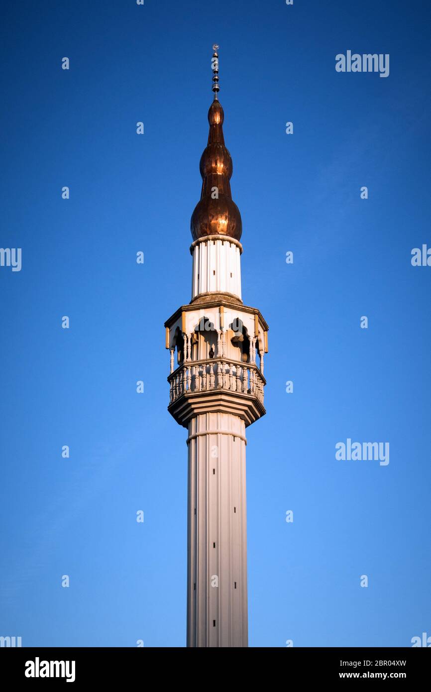 The tower of mosque in Banja Luka in Bosnia and Herzegovina on blue sky, building for Muslim religion. Stock Photo