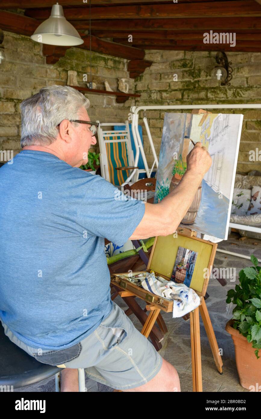 Man painting a picture hi-res stock photography and images - Alamy