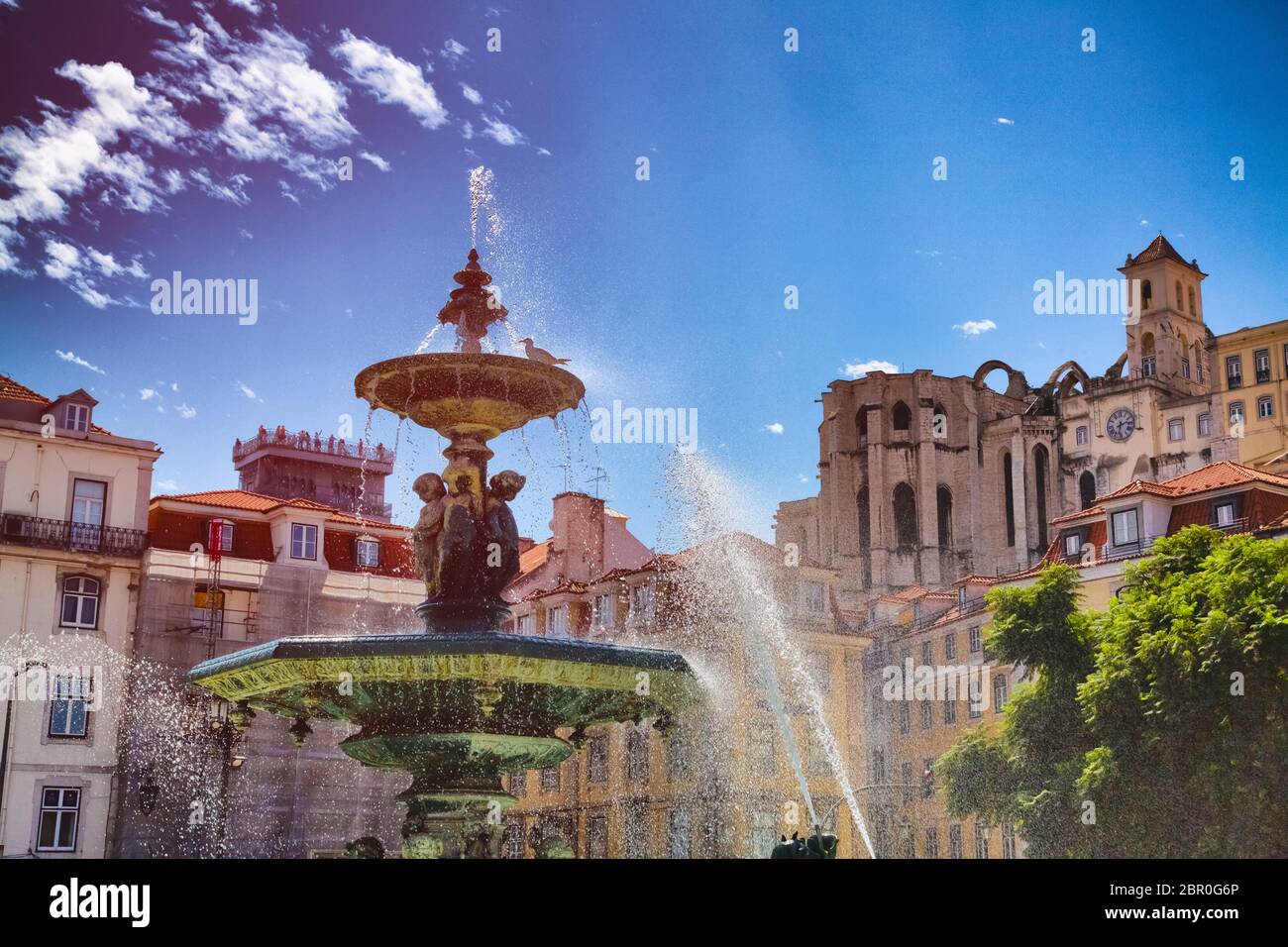 Water fountain on King Pedro IV Square in Rossio district in Lisbon City, Portugal Stock Photo