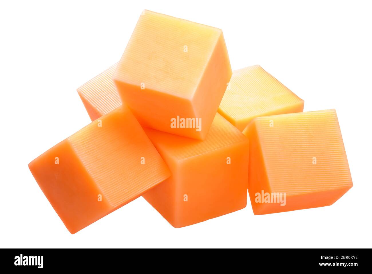 Cheddar cheese cubes, pile of, isolated on white, shadowless Stock