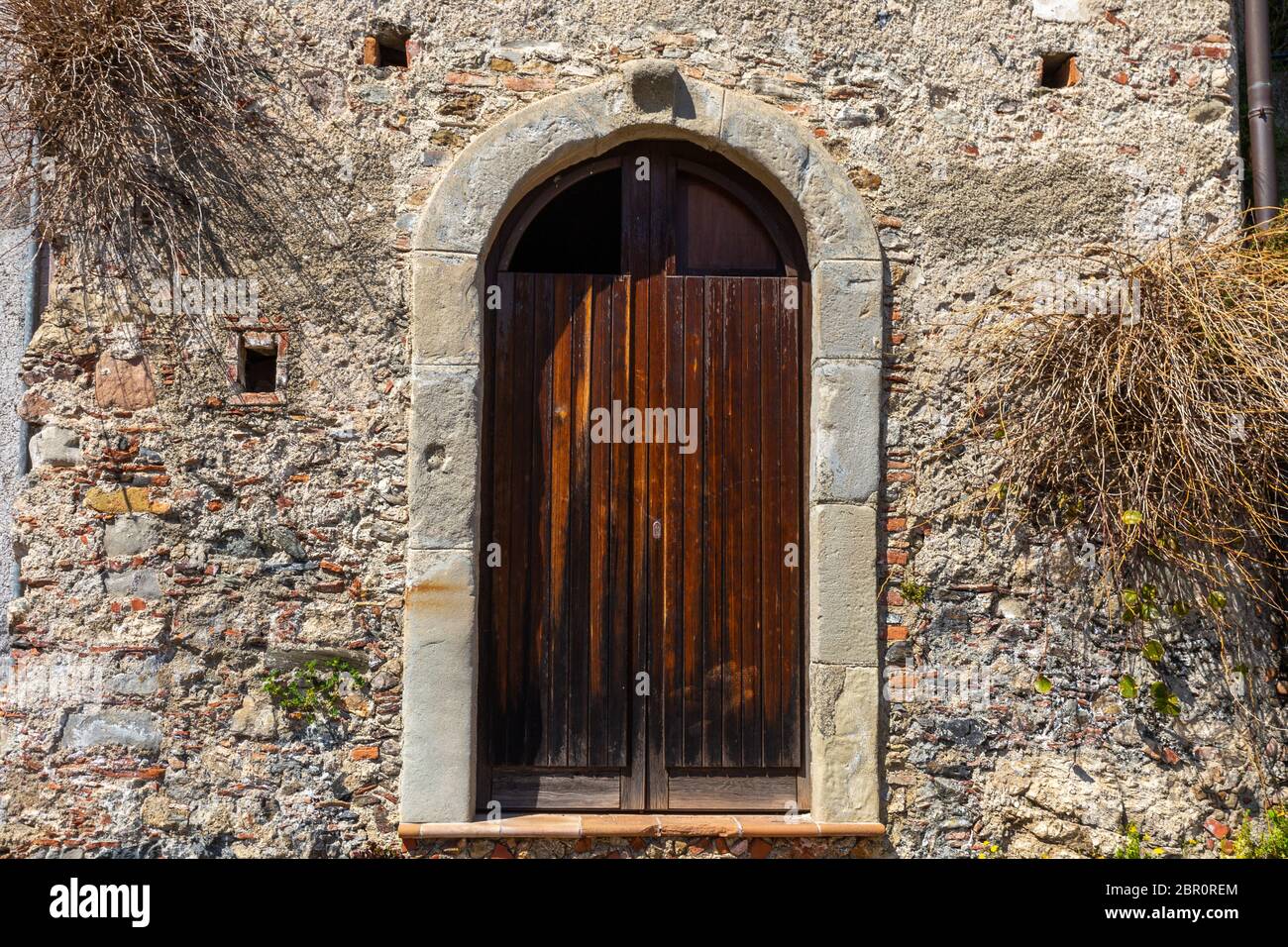 The Ancient door of a Sicilian house Stock Photo