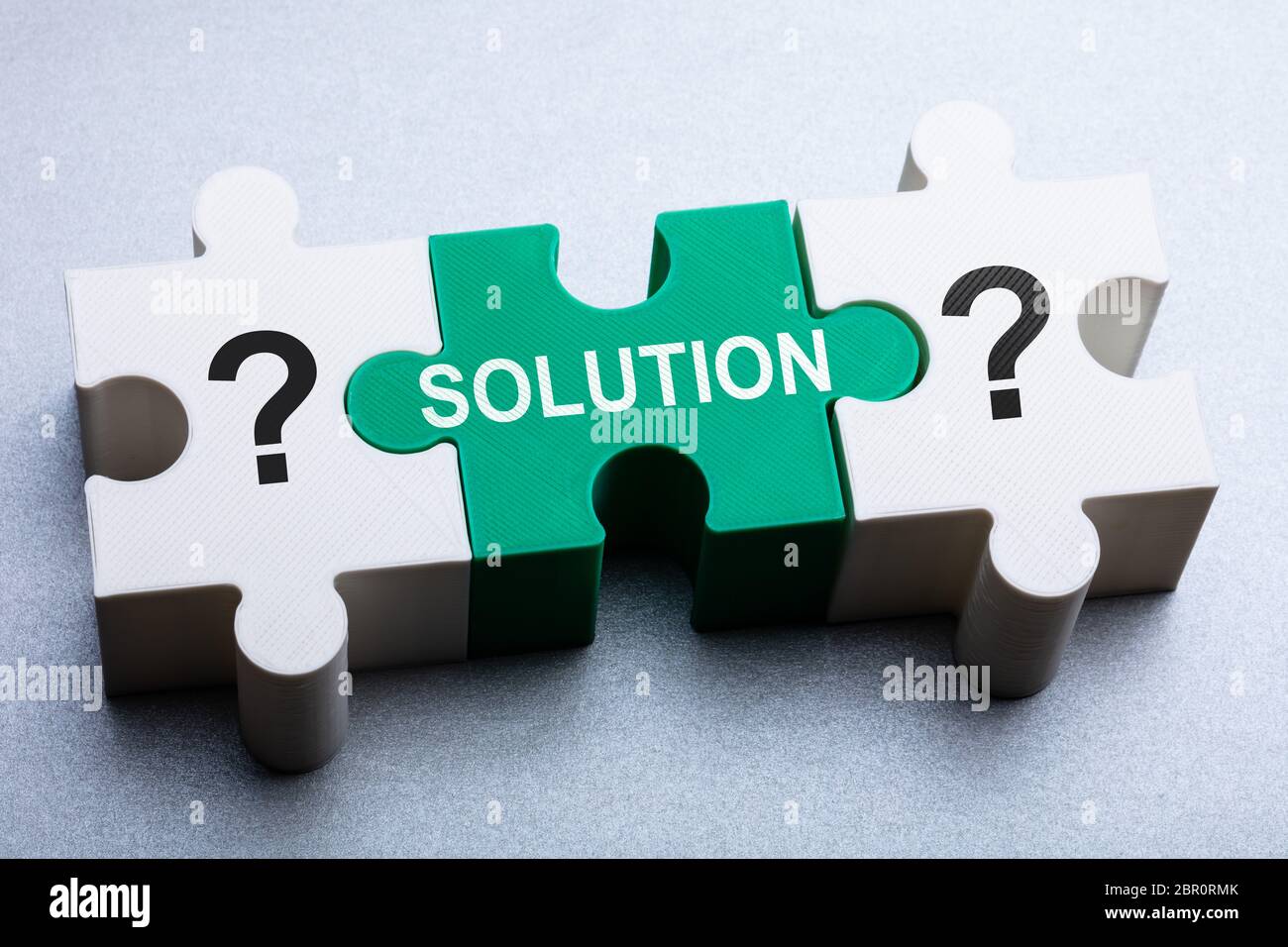 Solution Word Inmage An Elevated View Of Solution Word Made With Puzzle Over Grey Background ...