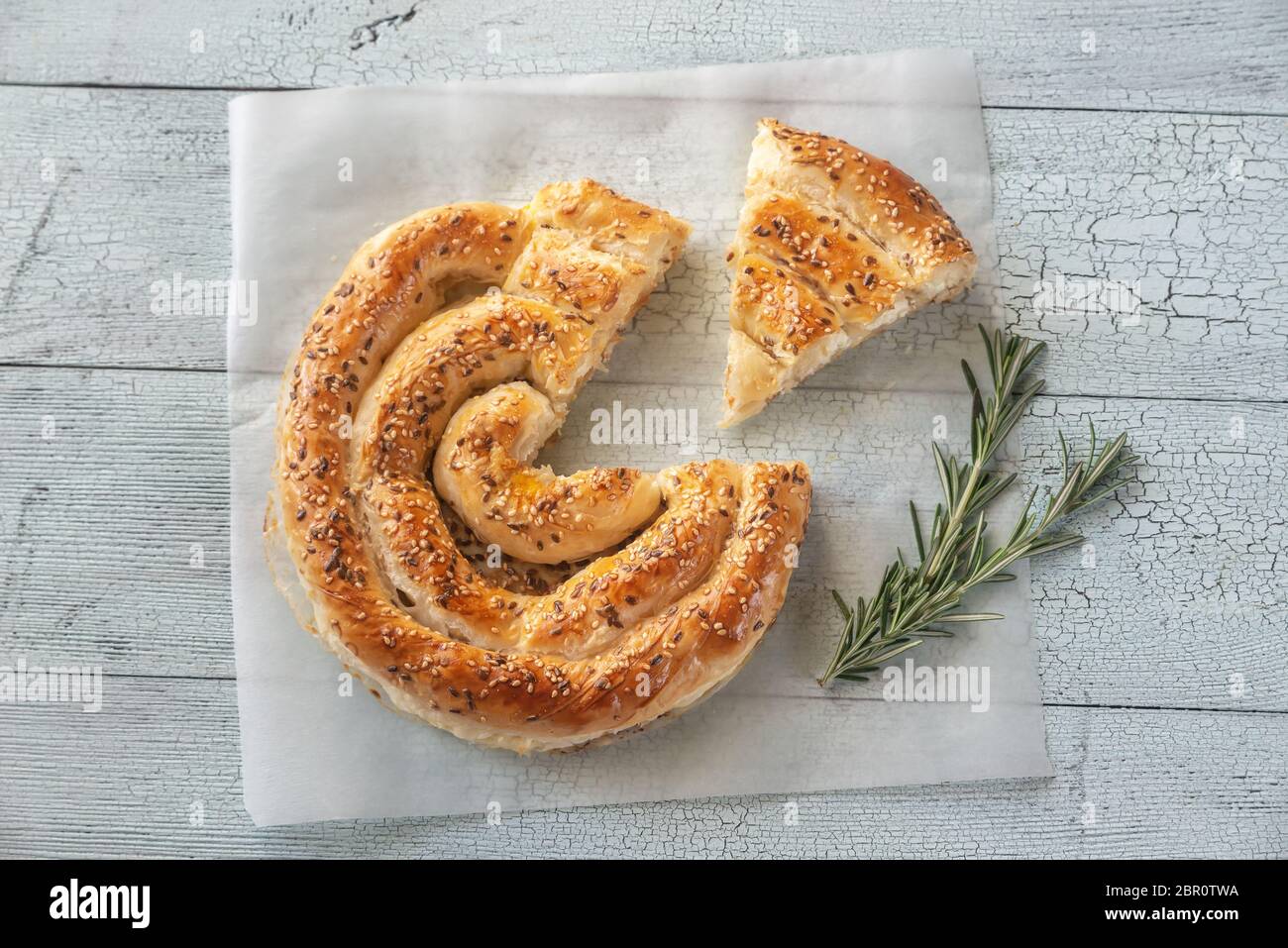 Spiral phyllo pie with feta flat lay Stock Photo
