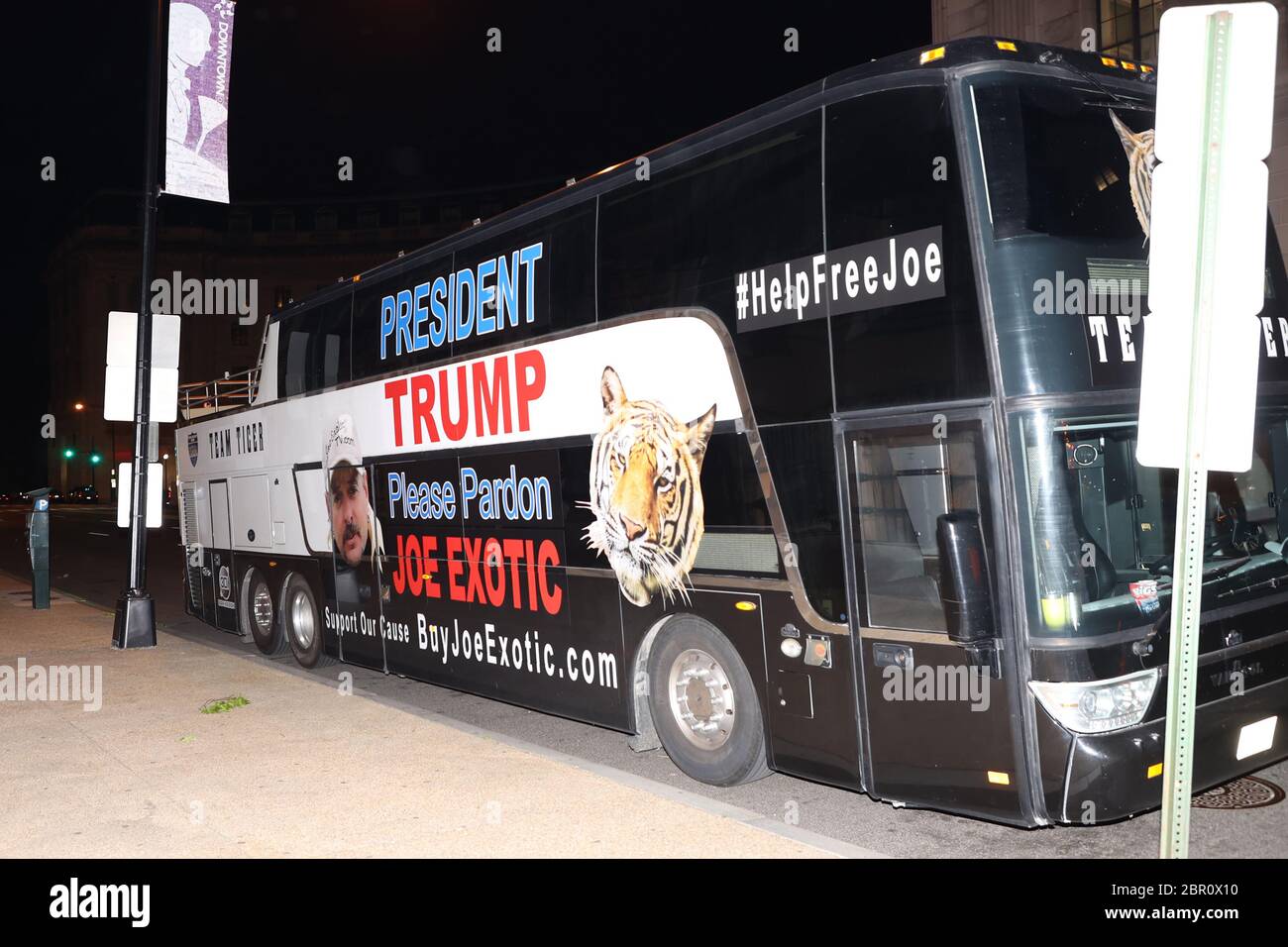 Washington, DC, USA. 19th May, 2020. Joe Exotic's legal team arrives in DC tonight in a bus with his likeness with hopes of getting a chance to see President Trump tomorrow morning and receive a pardon for Exotic. May 19, 2020 in Washington, DC Credit: Mpi34/Media Punch/Alamy Live News Stock Photo