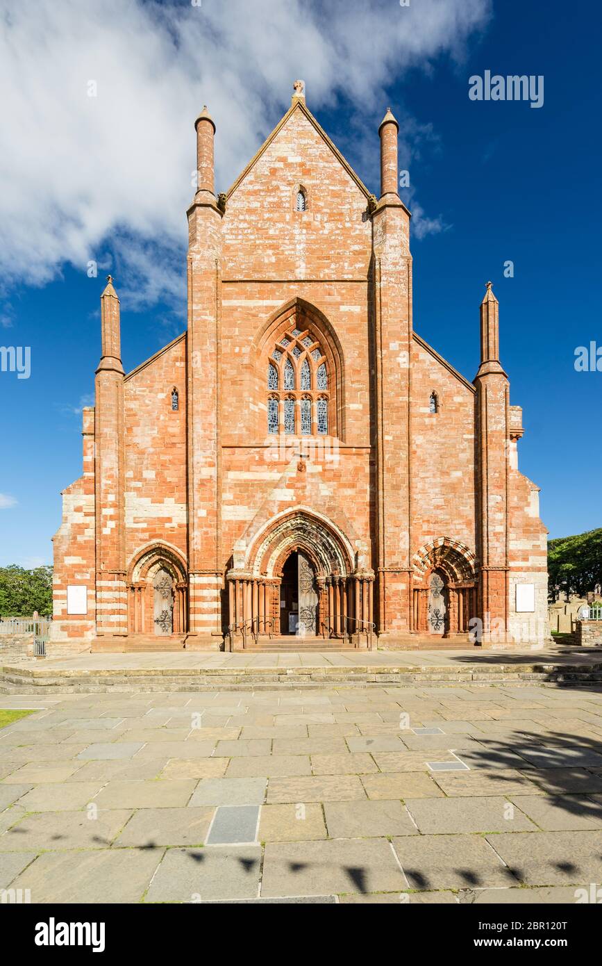 front view of St Magnus Cathedral on a sunny day in Kirkwall, Orkney Islands, Scotland. The holy red sandstone architecture is part of the church of S Stock Photo