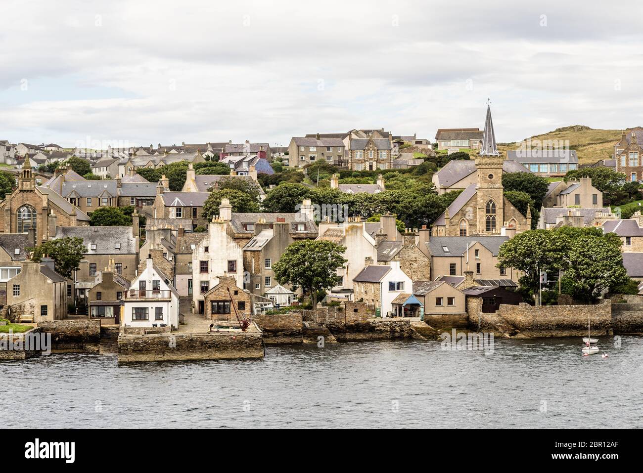 historic village of Stromness on Orkney mainland, Scotland, Uk. Seaside view of this fisherman town at Hoy sound Stock Photo