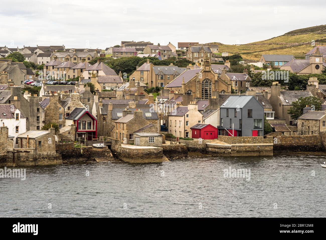 historic village of Stromness on Orkney mainland, Scotland. Seaside view of this fisherman town at Hoy sound Stock Photo