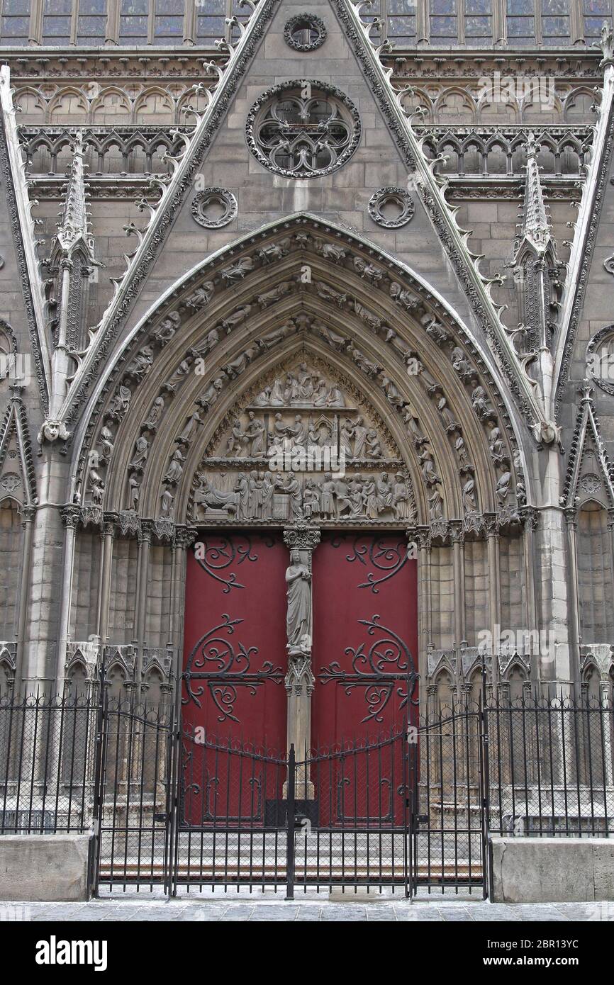 Big Double Doors at Notre Dame Cathedral in Paris France Stock Photo