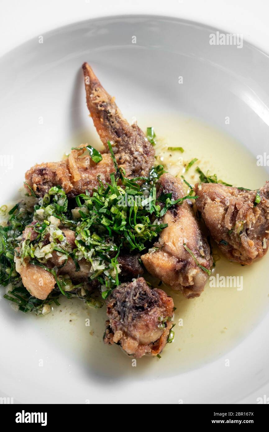 Portuguese spicy marinated deep fried chicken Frango a Passarinho traditional tapas dish with