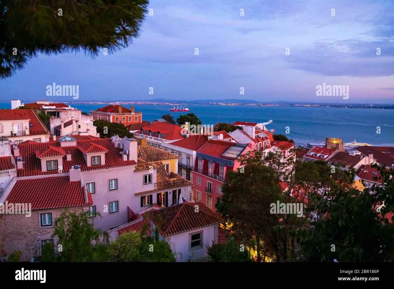 View of Tagus River in Lisbon city at the evening, seen from Sao Jorge Castle hill, Portugal Stock Photo