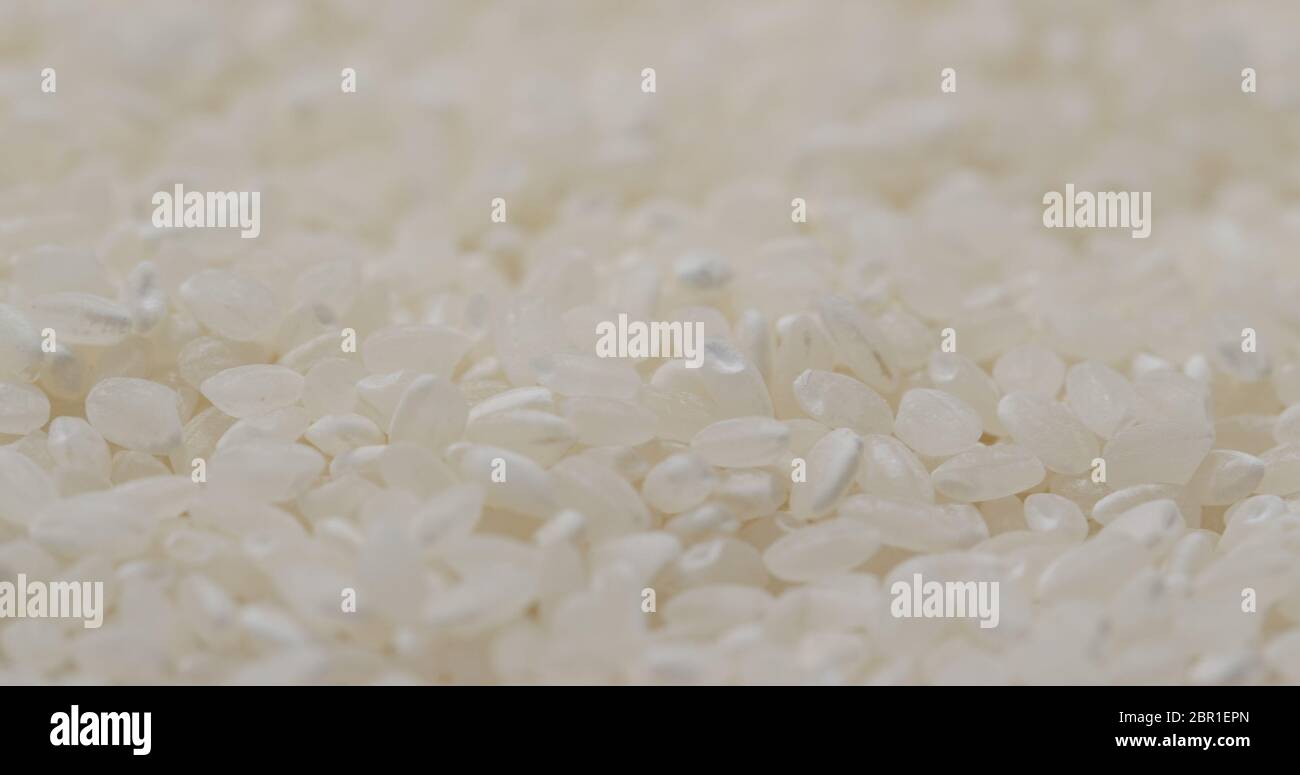 Stack of white rice Stock Photo - Alamy