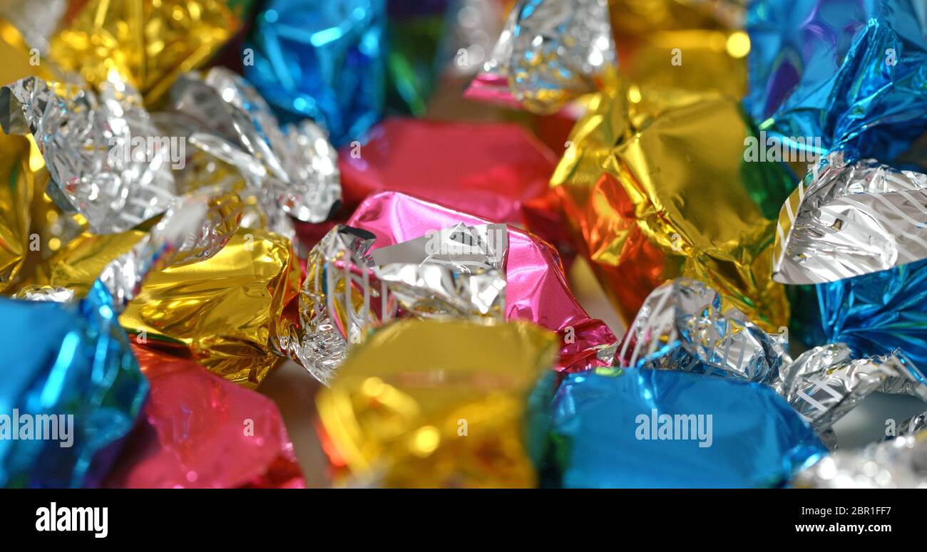 Colourful plastic wrap candy Stock Photo Alamy
