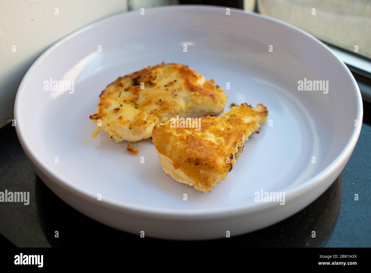 Fried chicken in a white bowl. Stock Photo