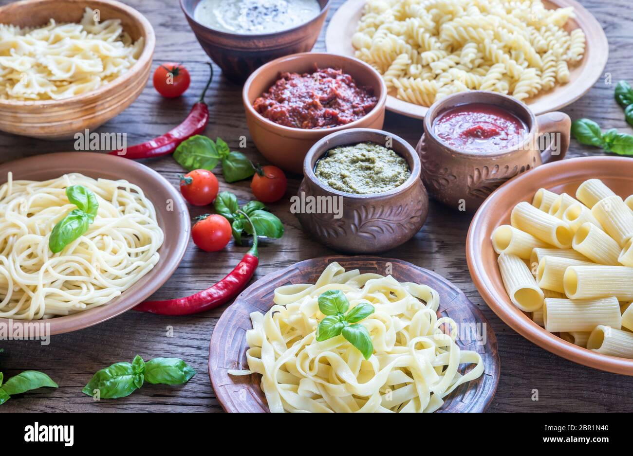 Pasta with different kinds of sauce Stock Photo Alamy