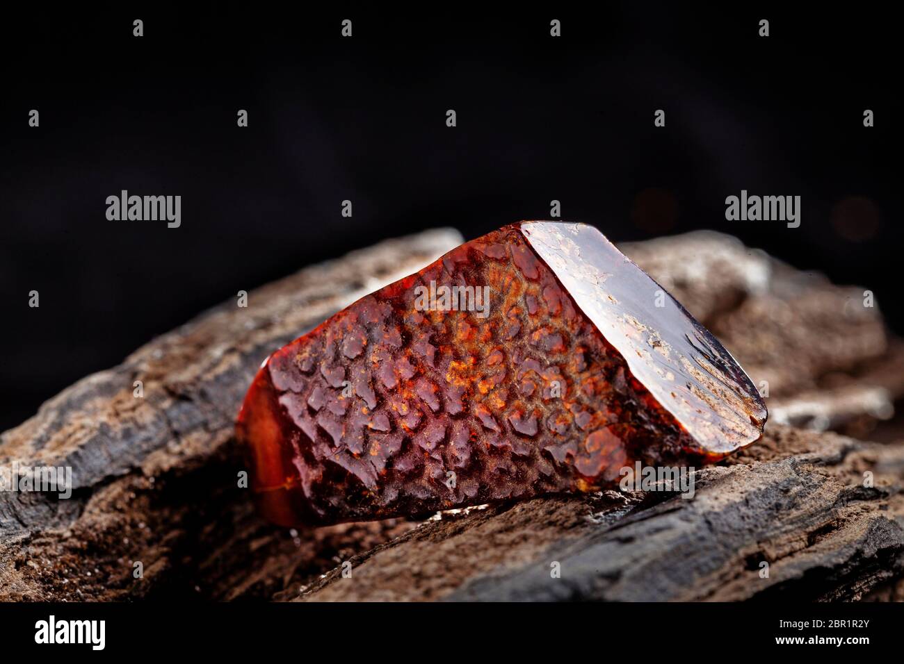 A Piece Of Dark Red Semi Transparent Natural Amber Classification Color Cherry Or Dragon Blood Has Cracks On Its Surface Polished Oval Shape Plac Stock Photo Alamy