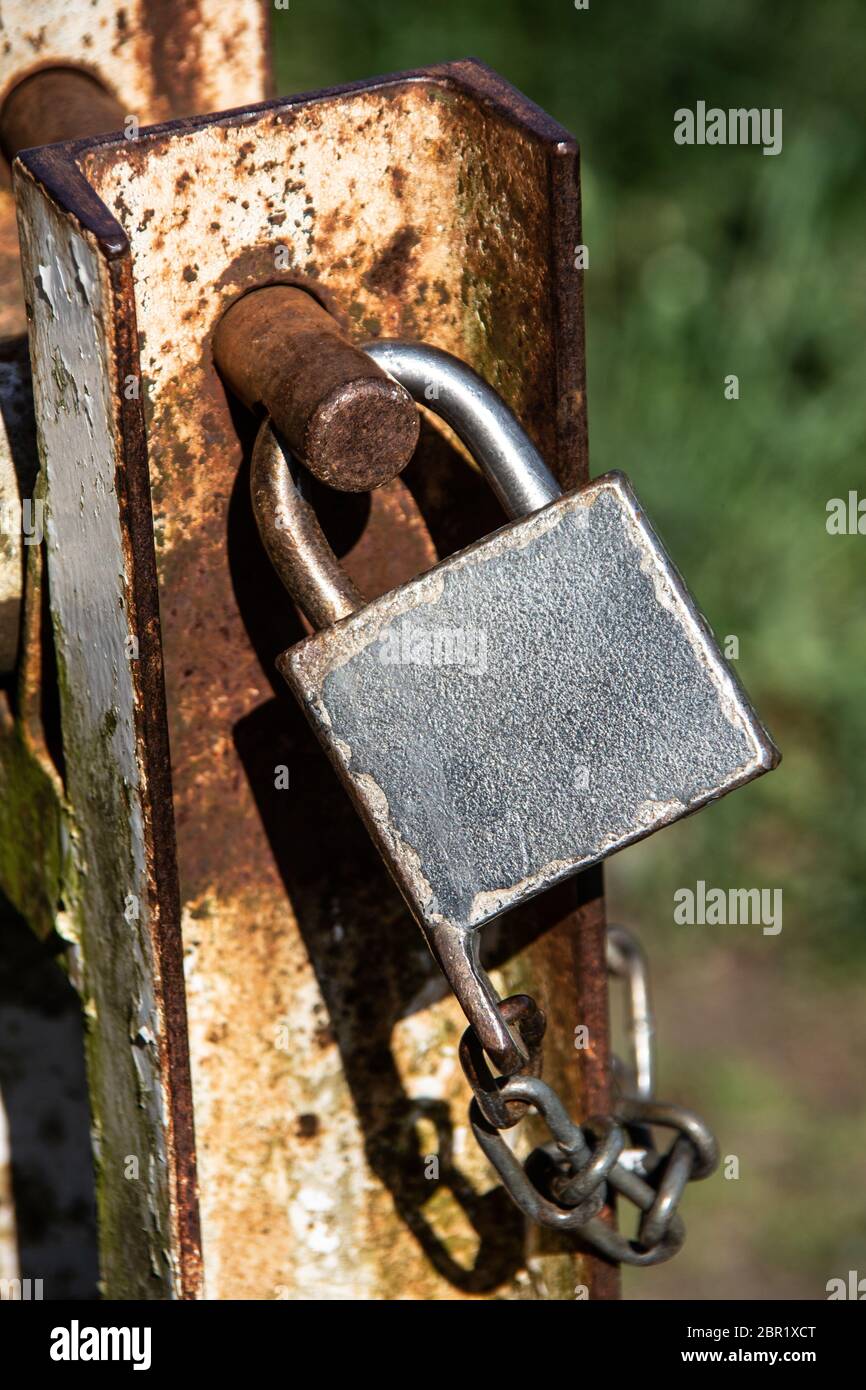 big padlock at gate Stock Photo - Alamy