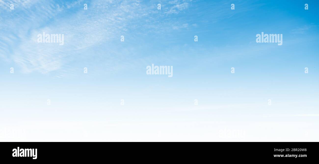 Clear blue sky and white clouds summer background Stock Photo - Alamy