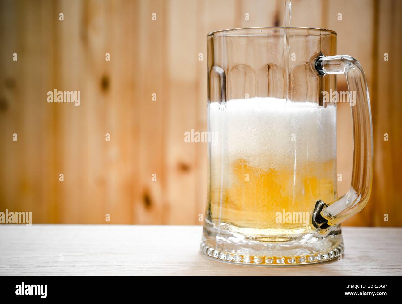 Beer mug on the wooden background Stock Photo