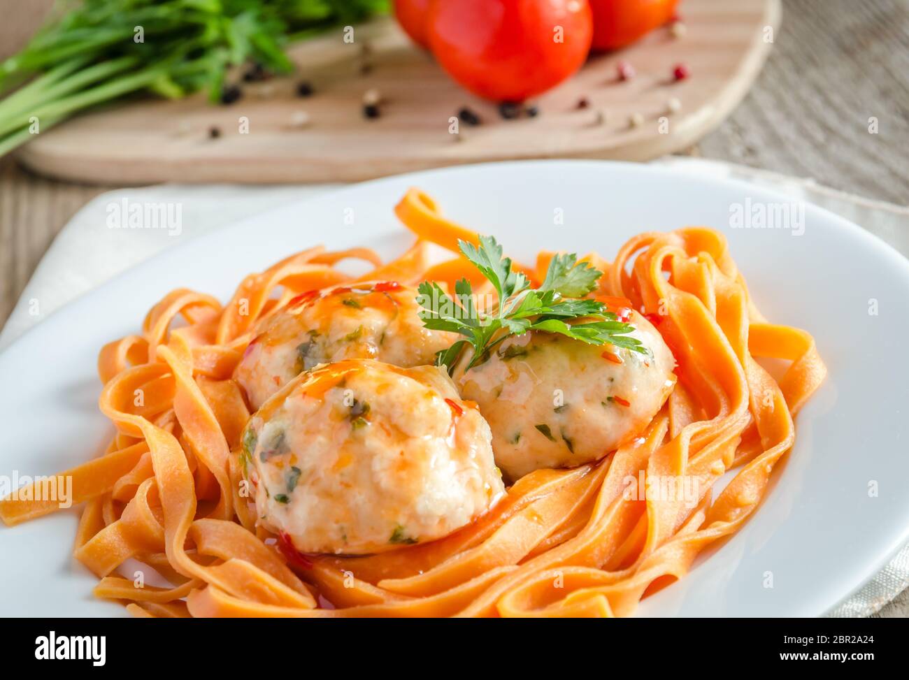 Chicken meatballs with pasta Stock Photo Alamy