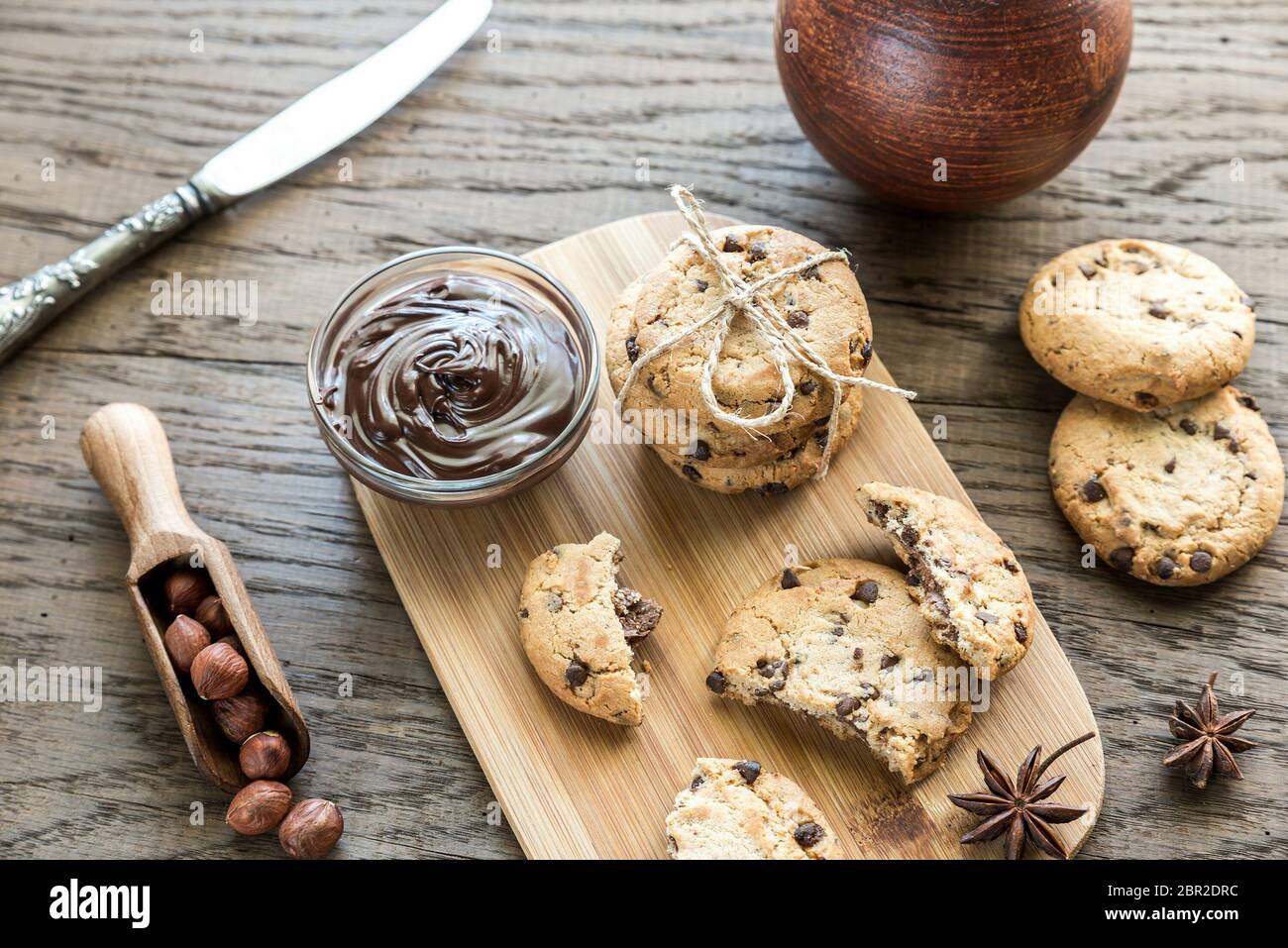 Cookies with chocolate cream and hazelnuts Stock Photo