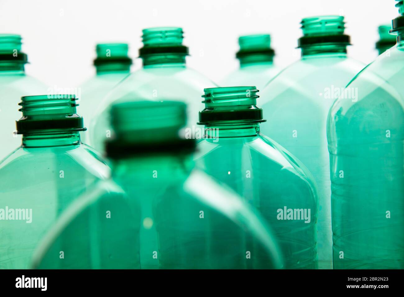 Close up of green plastic water bottles. Household recycling Stock
