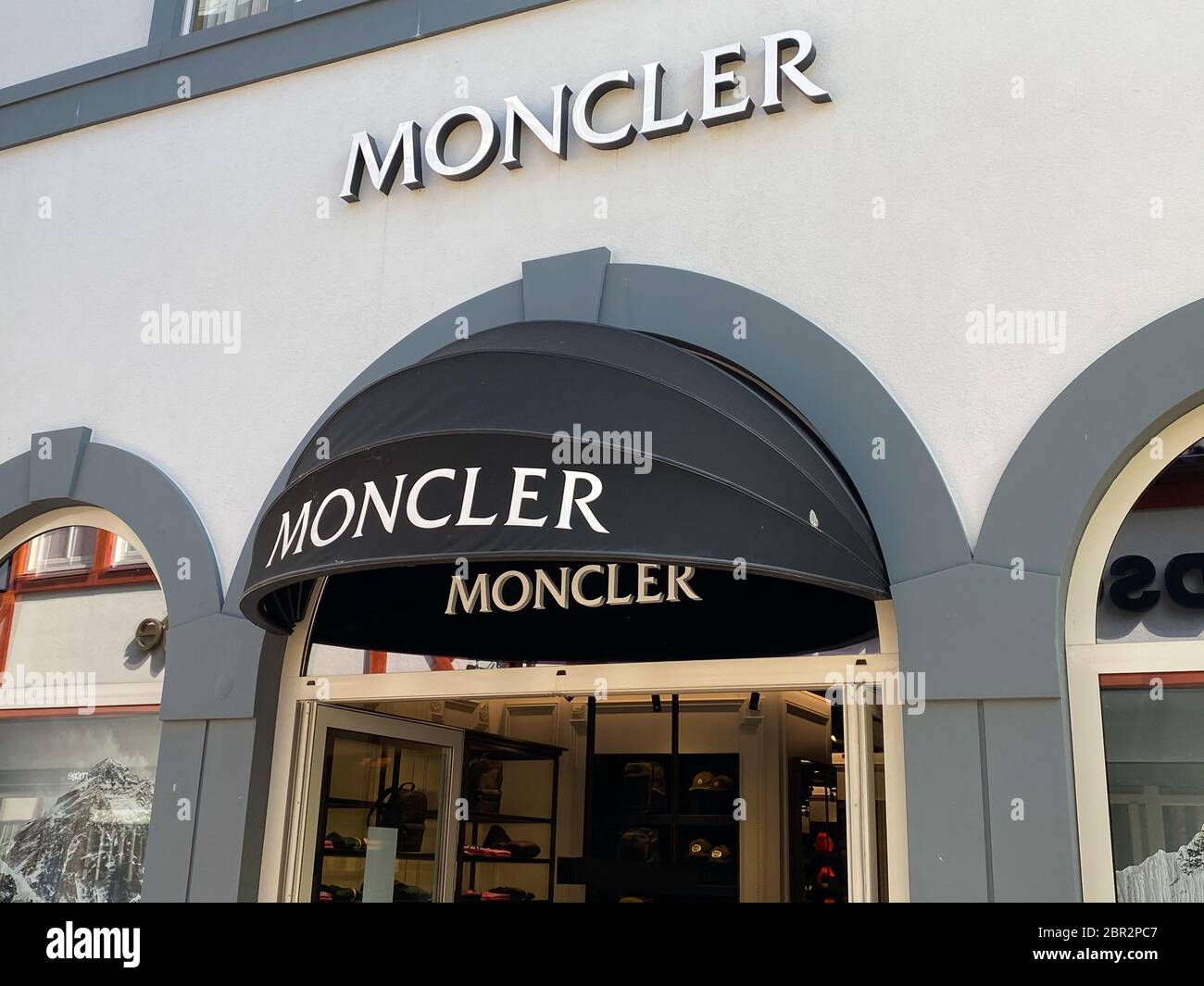 Roermond, Netherlands - May 19. 2020: View on facade with logo lettering of  Moncler fashion company at shop entrance Stock Photo - Alamy