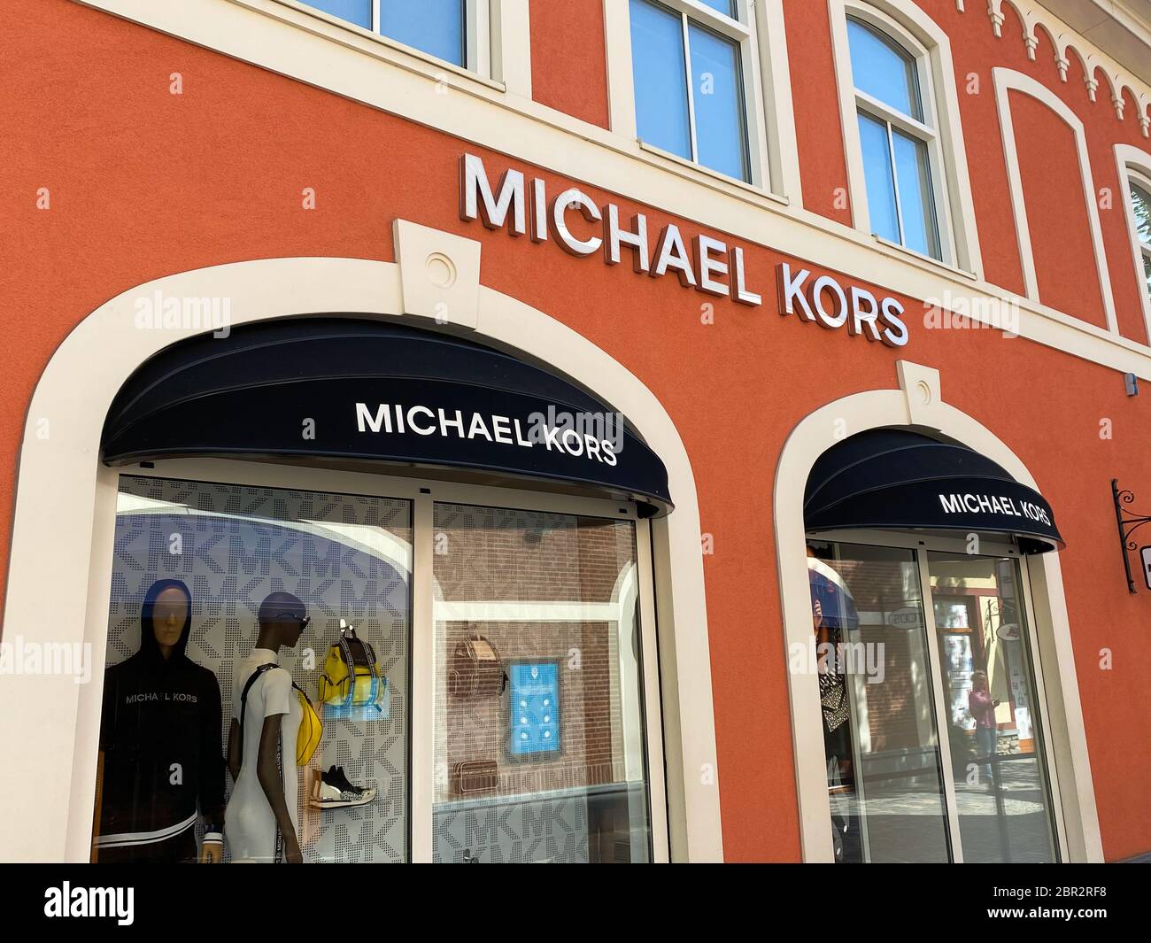 Roermond, Netherlands - May 19. 2020: View on facade with logo lettering of Michael  Kors fashion company at shop entrance Stock Photo - Alamy
