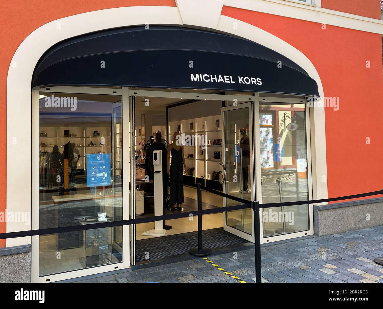 Roermond, Netherlands - May 19. 2020: View on facade with logo lettering of Michael  Kors fashion company at shop entrance Stock Photo - Alamy