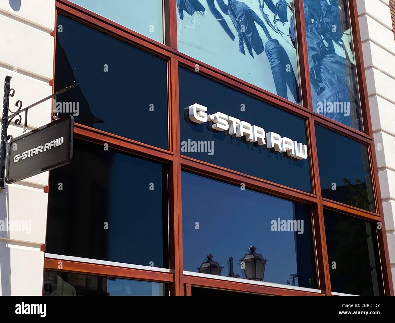 Roermond, Netherlands - May 19. 2020: View on facade with logo lettering of  G-Star Raw company at shop entrance Stock Photo - Alamy