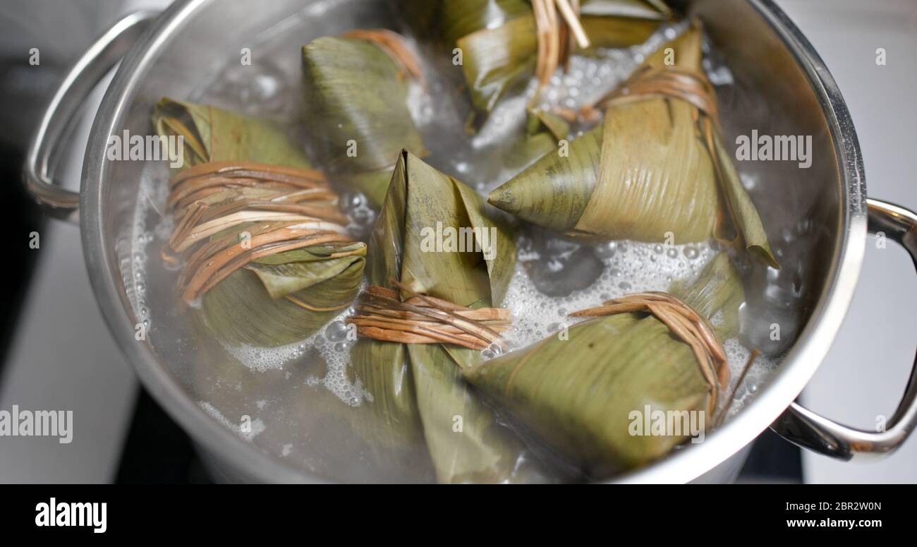 Cooking with rice dumpling Stock Photo - Alamy