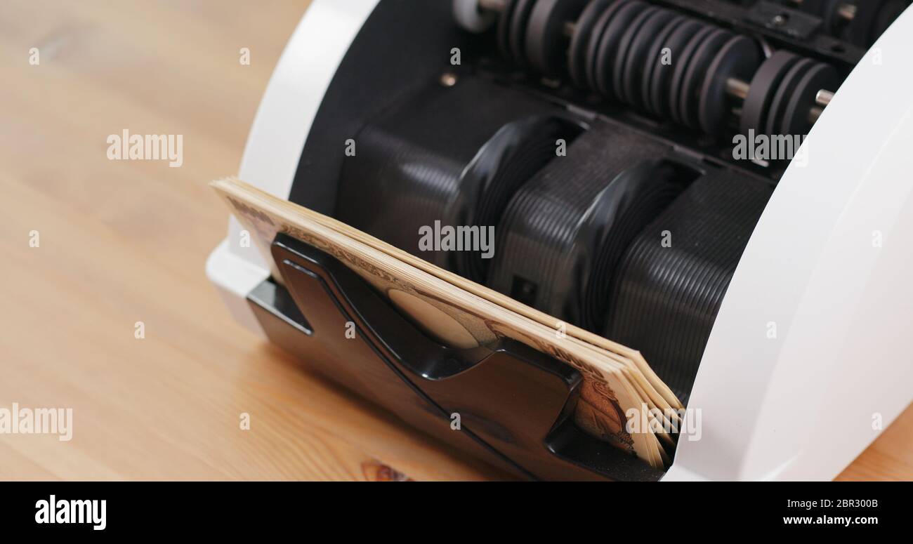 Money counter for Japanese banknote Stock Photo Alamy