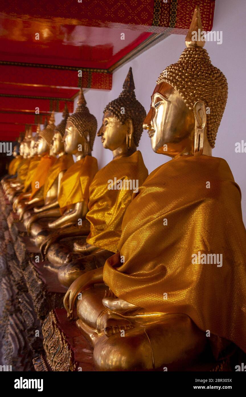 Golden Buddhas statues at Wat Pho in Bangkok, Thailand. Stock Photo