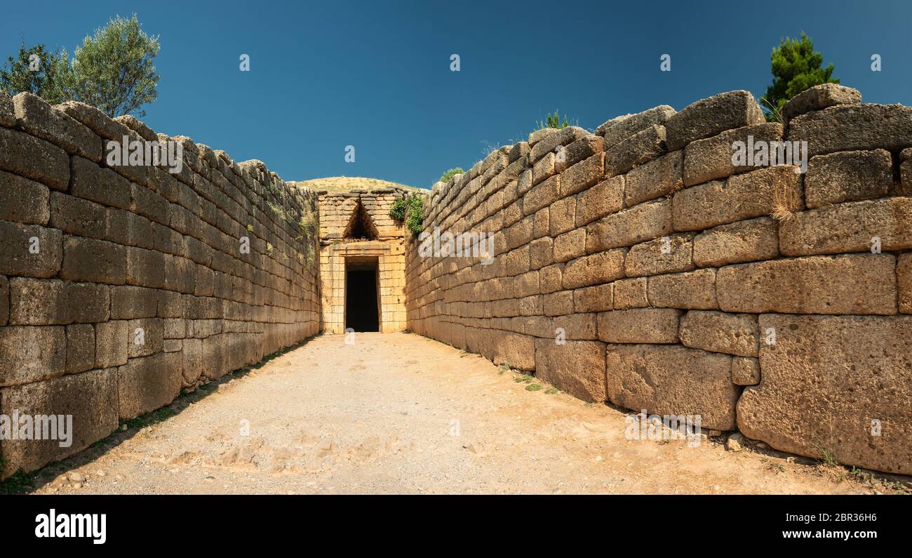 The triangle crowning above the entrance to the Treasury of Atreus, a beehive-type tomb dating to 13th century B.C. in ancient Greece. Stock Photo