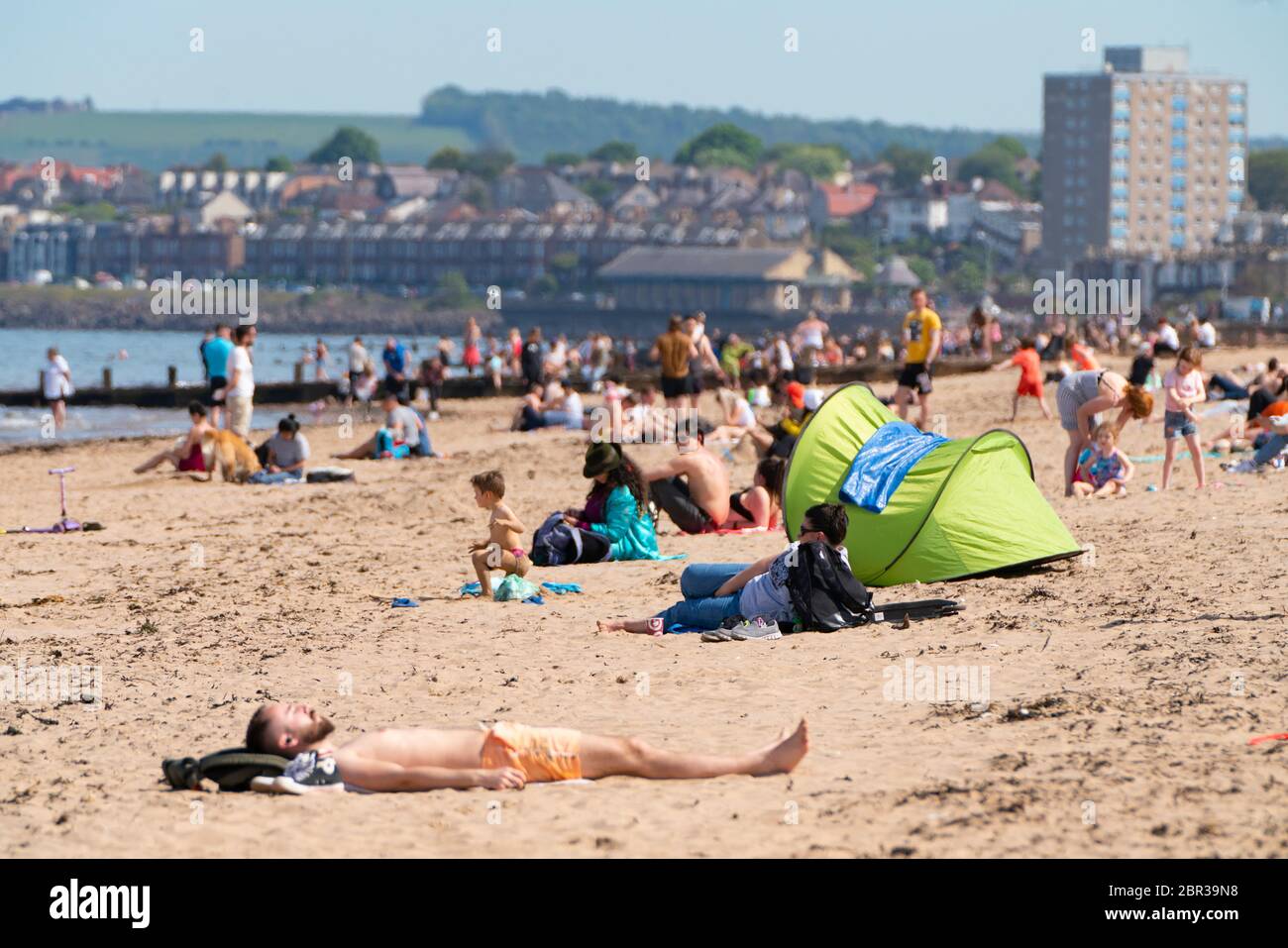 Portobello, Scotland, UK. 20 May 2020. Hot sunny weather brought out