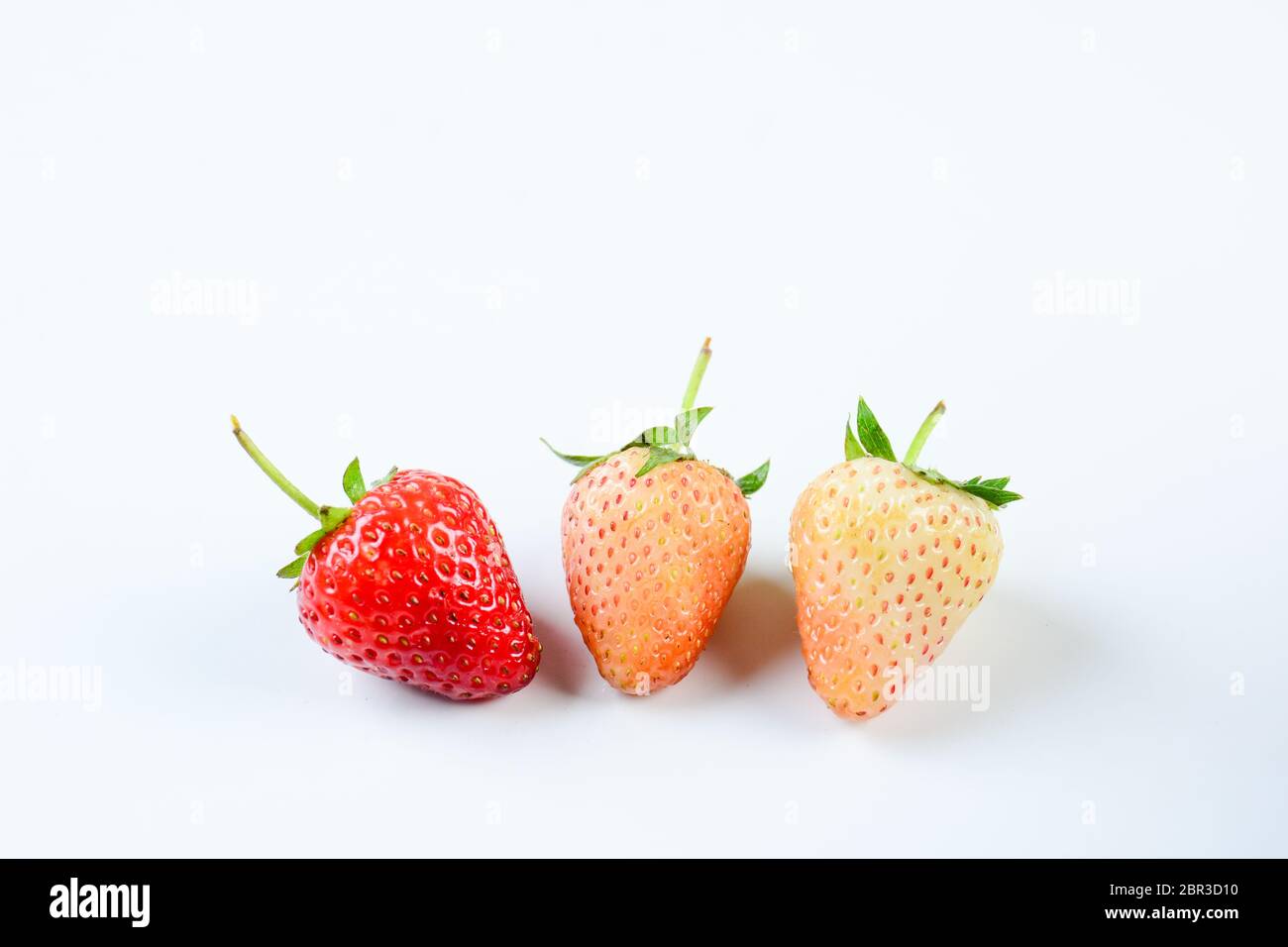 Fresh strawberries on white background Stock Photo - Alamy