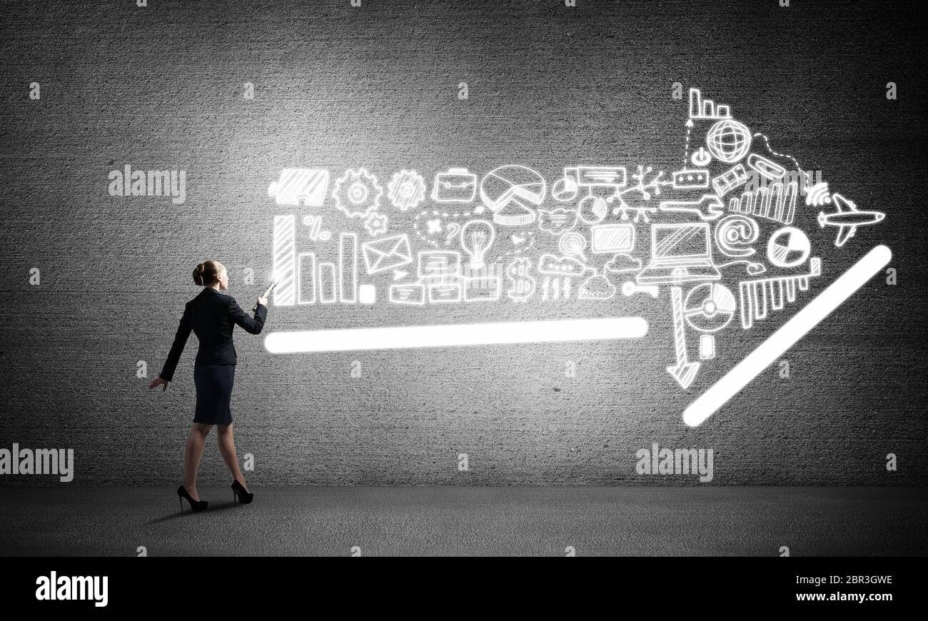 Woman throwing light on her ideas Stock Photo Alamy