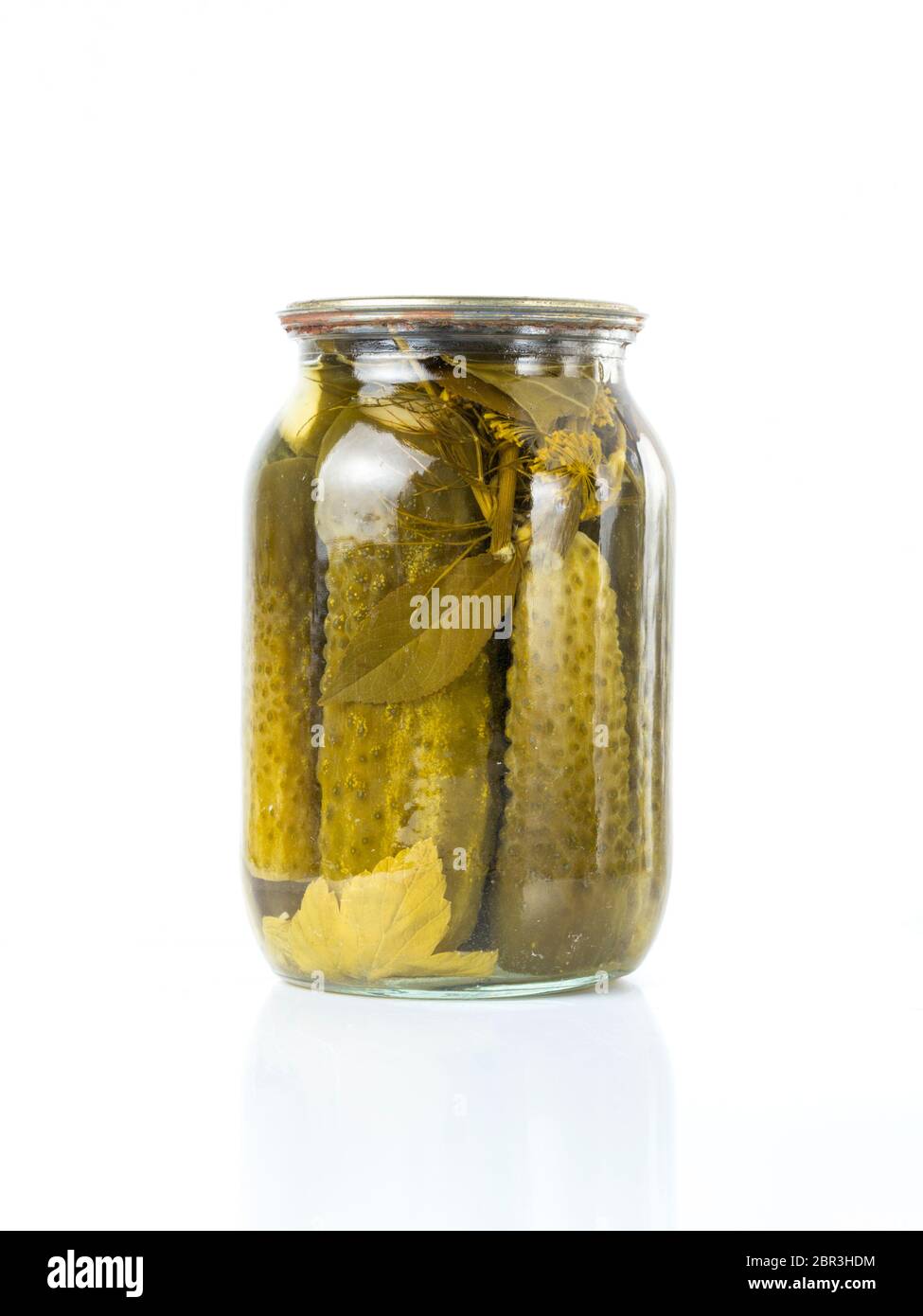 Pickled cucumbers isolated. Pickles in glass jar isolated on white