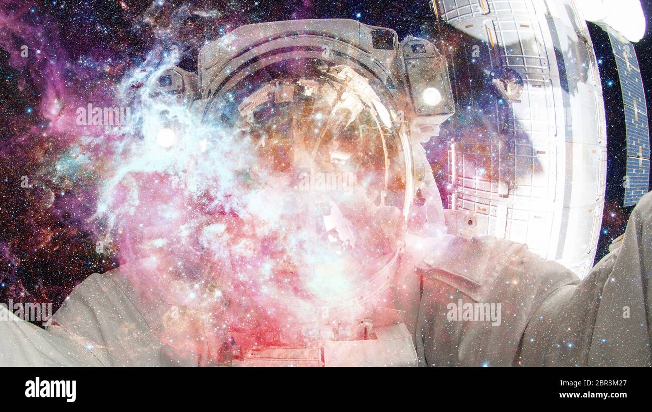 Astronaut in outer space. Science fiction art. Elements of this image ...