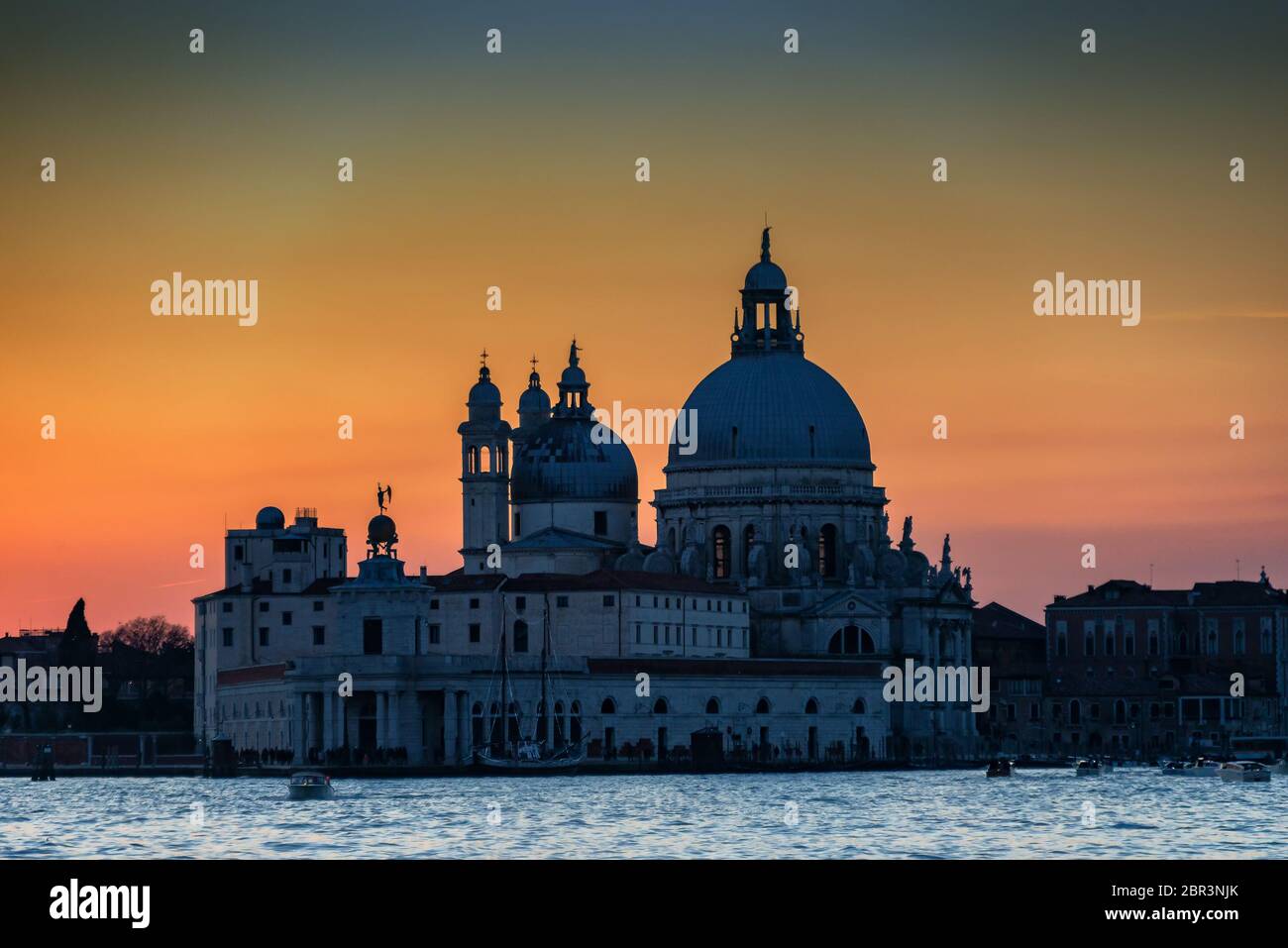 Breathtaking sunset over the lagoon of Venice and the Basilica of Santa ...