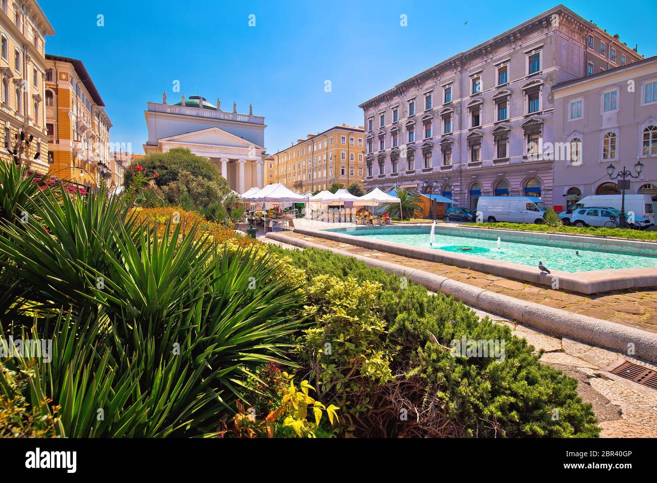 Trieste Piazza Sant Antonio Nuovo fountain and church colorful view, Friuli Venezia Giulia region of Italy Stock Photo