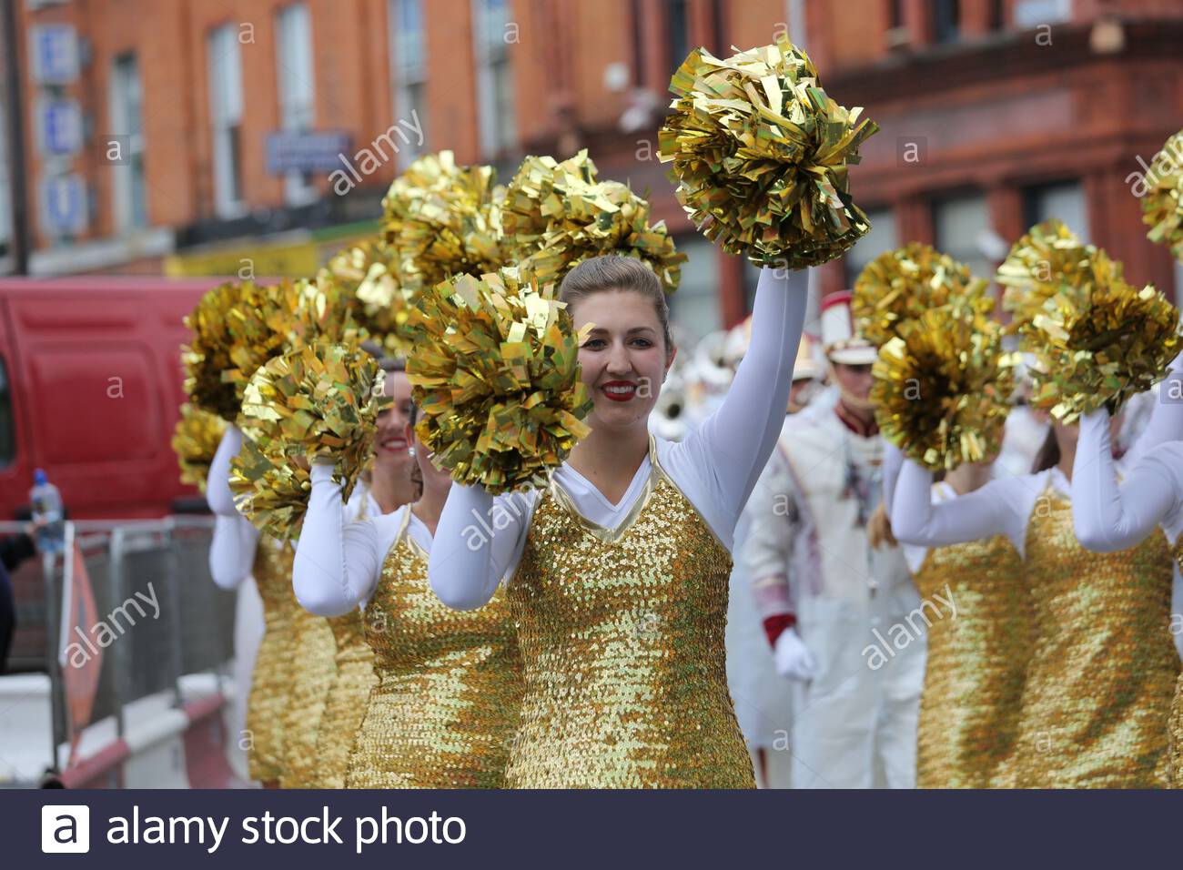 An American cheerleading group parade through Dublin city centre on a