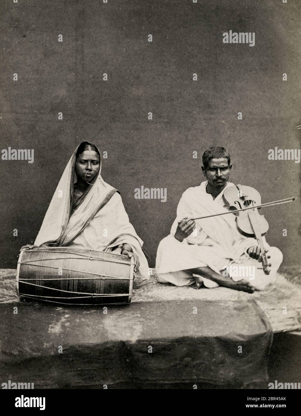 Indian musicians, drums and stringed instrument Stock Photo