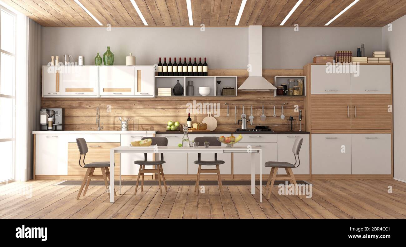 Modern white and wooden kitchen with dining table on hardwood floor